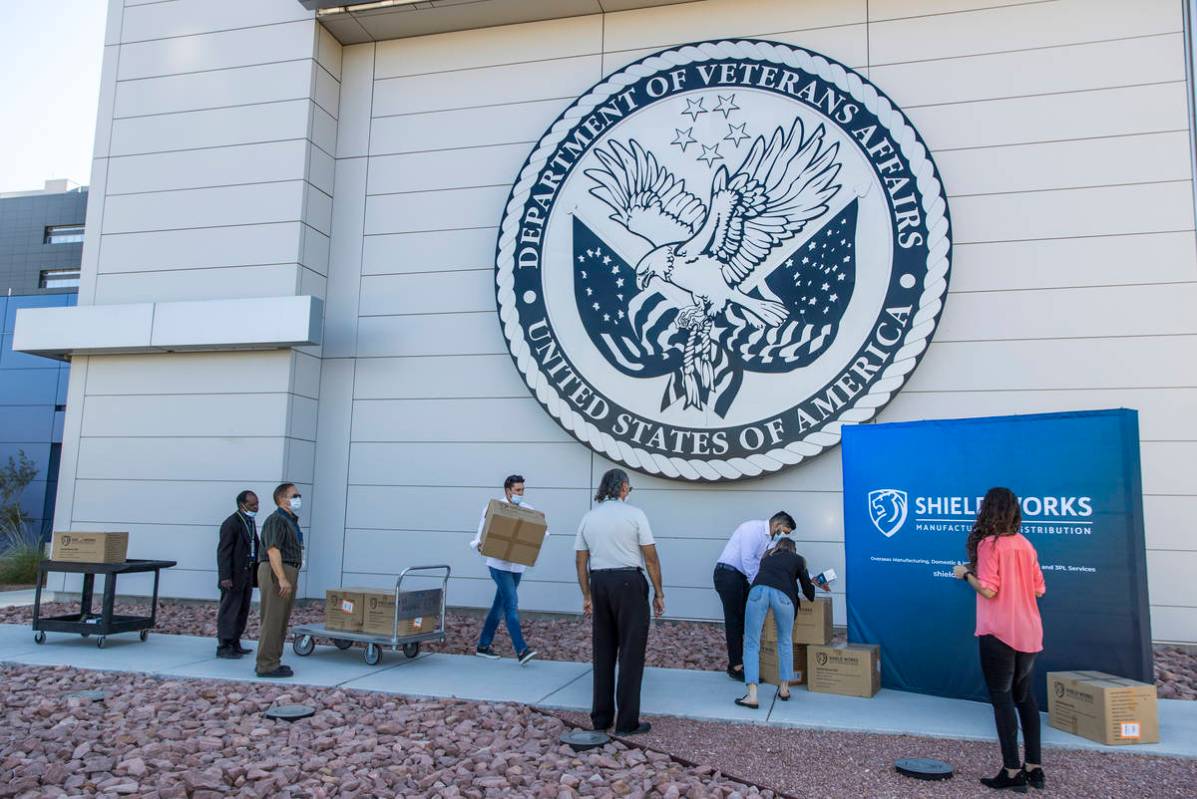 The owners of Shield Works gather to donate 100,000 masks to the VA Hospital currently running ...
