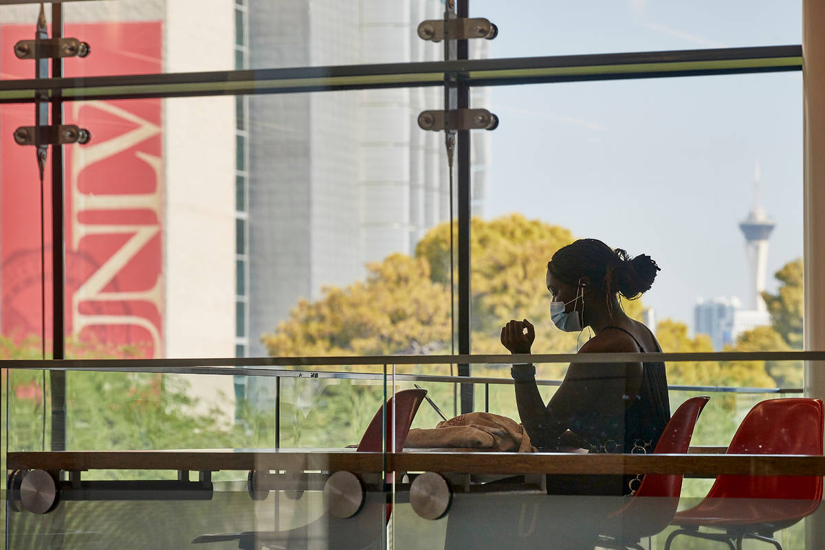 Su-Hanah Andrews, a sophomore political science student, does schoolwork in August at UNLV's Ho ...