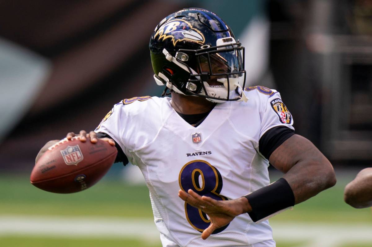 Baltimore Ravens quarterback Lamar Jackson (8) in action during the NFL football game against t ...