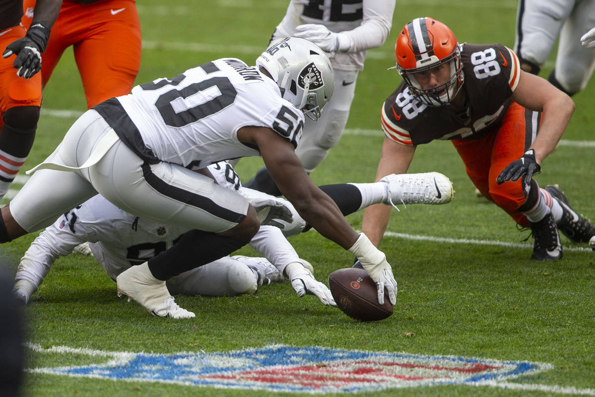 Las Vegas Raiders linebacker Nicholas Morrow (50) reaches to recover a fumble made by Cleveland ...