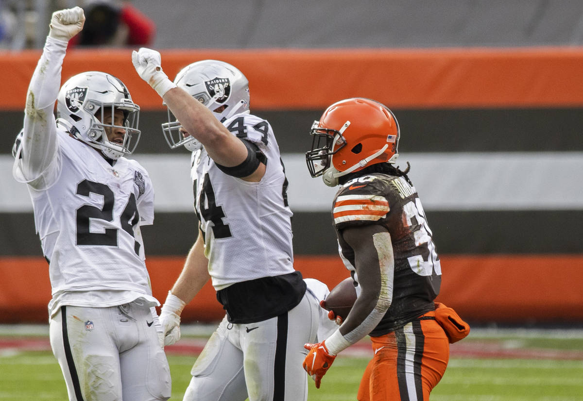 Las Vegas Raiders strong safety Johnathan Abram (24) and Las Vegas Raiders inside linebacker Ni ...