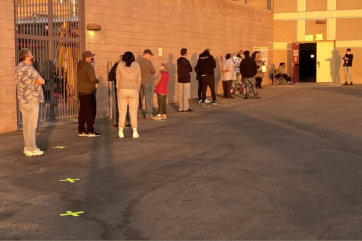 People wait in line to vote at Desert Breeze Community Center in Las Vegas, Tuesday, Nov. 3, 20 ...