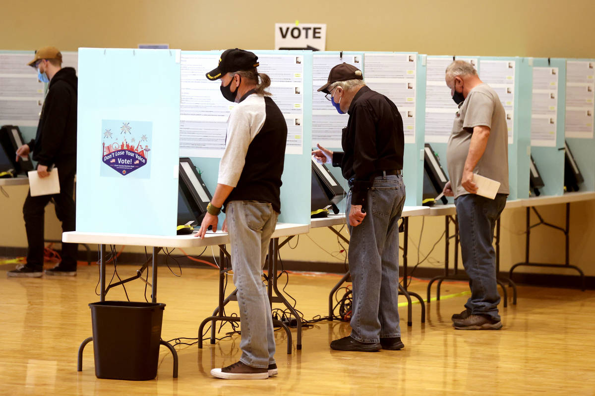People vote at Historic Fifth Street School in downtown Las Vegas on Election Day Tuesday, Nov. ...
