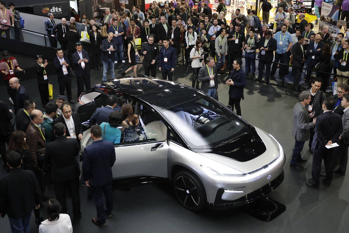 In this Jan. 3, 2017, file photo, Faraday Future's FF 91 electric car is unveiled during a news ...