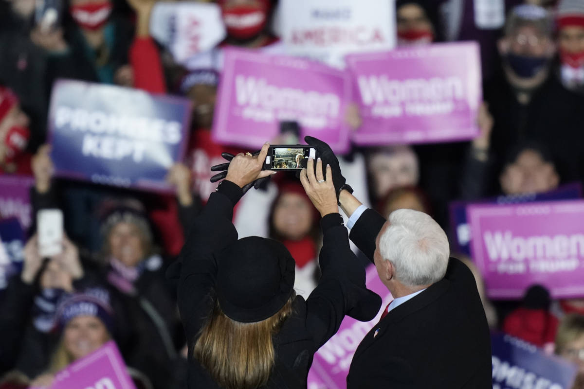 Vice President Mike Pence and his wife Karen take a selfie before the vice president speaks dur ...