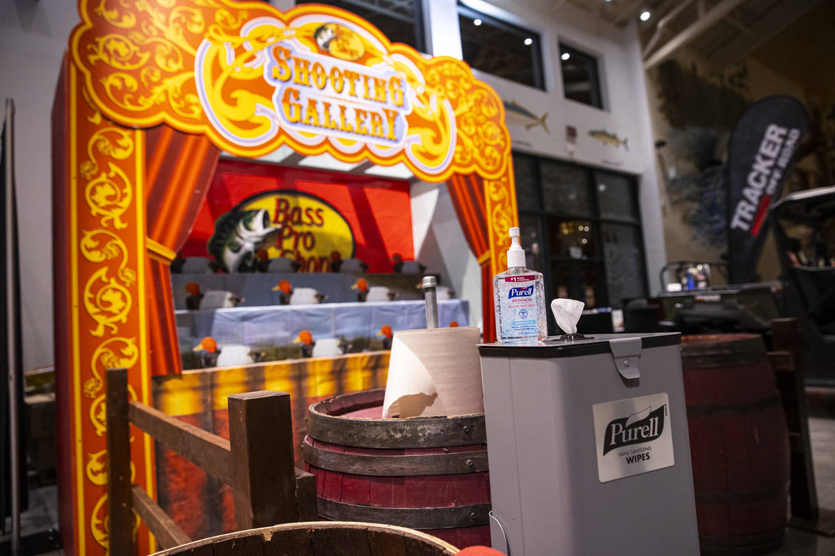 Sanitizater and wipes are seen at a shooting gallery the Santa's Wonderland space at Bass Pro S ...
