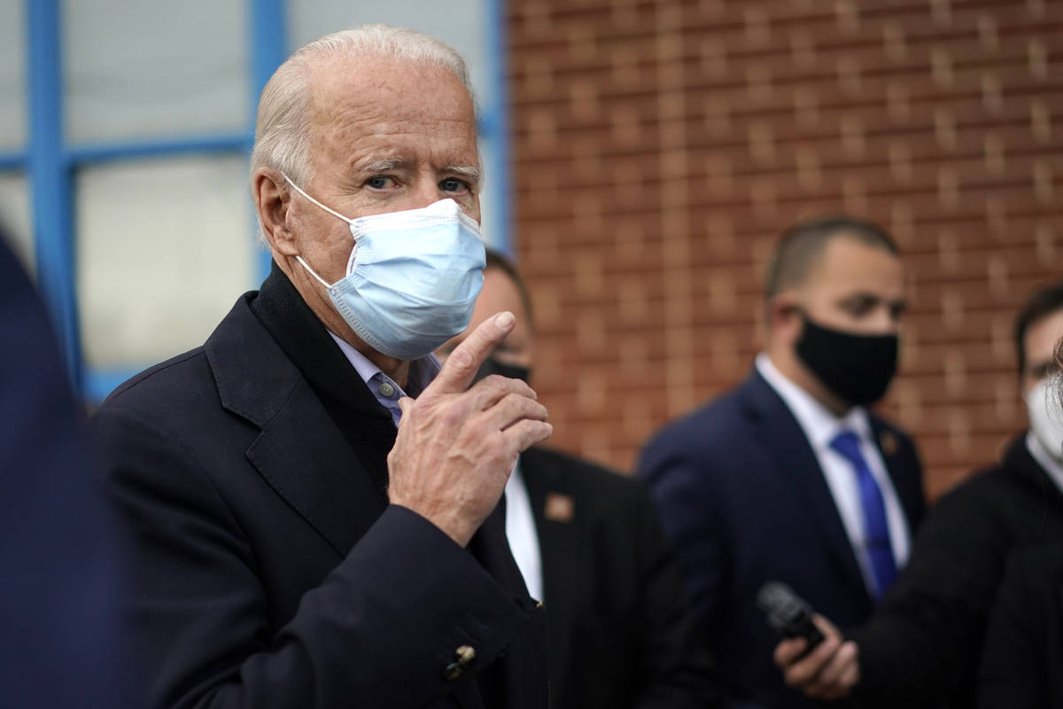 Democratic presidential candidate former Vice President Joe Biden speaks to reporters during a ...