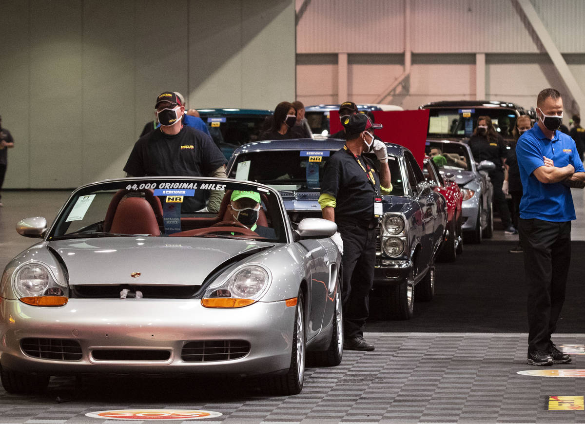 Classic cars are displayed to be auctioned at the Las Vegas Convention Center where Mecum Aucti ...