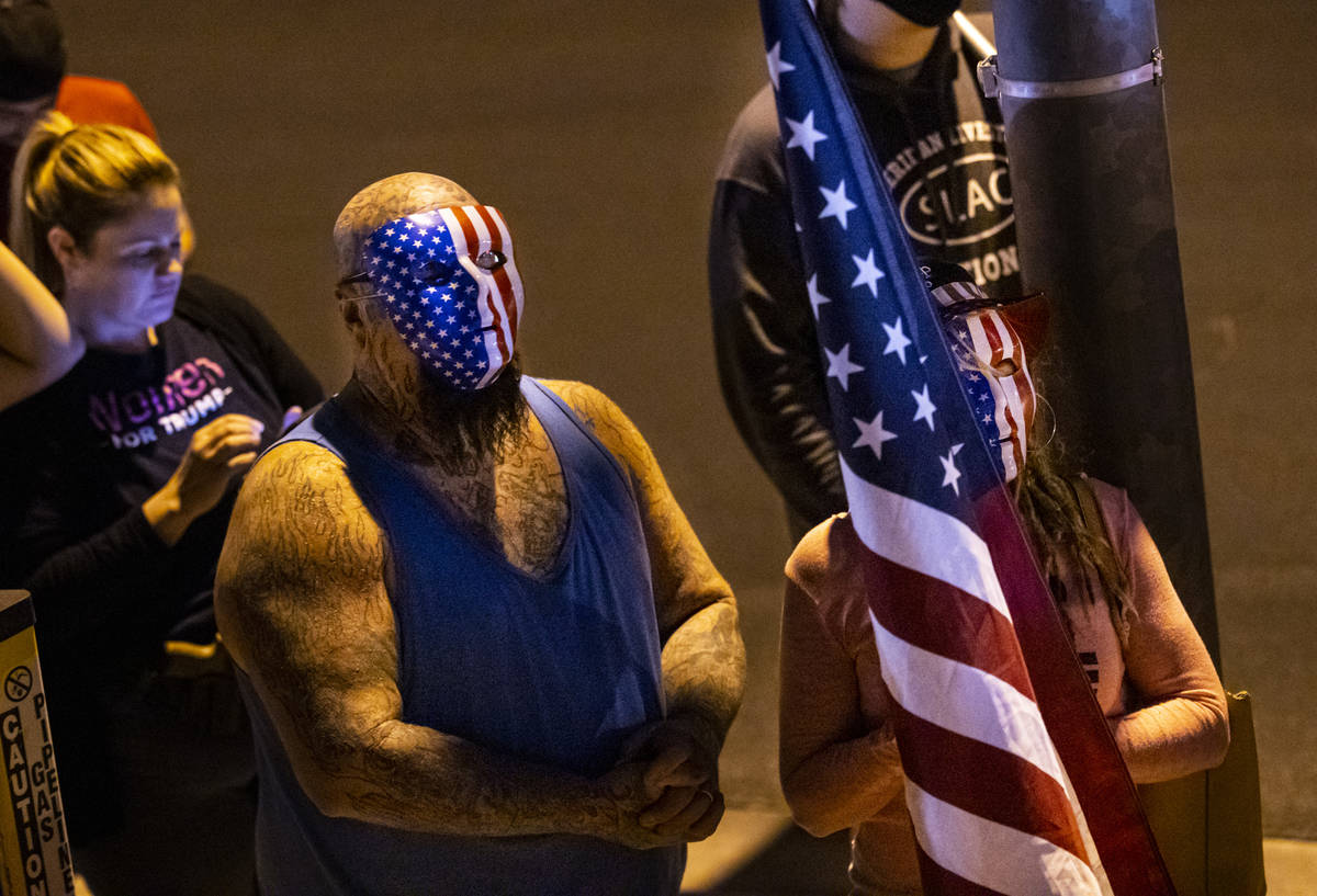 Supporters of President Donald Trump protest outside of the Clark County Election Department bu ...