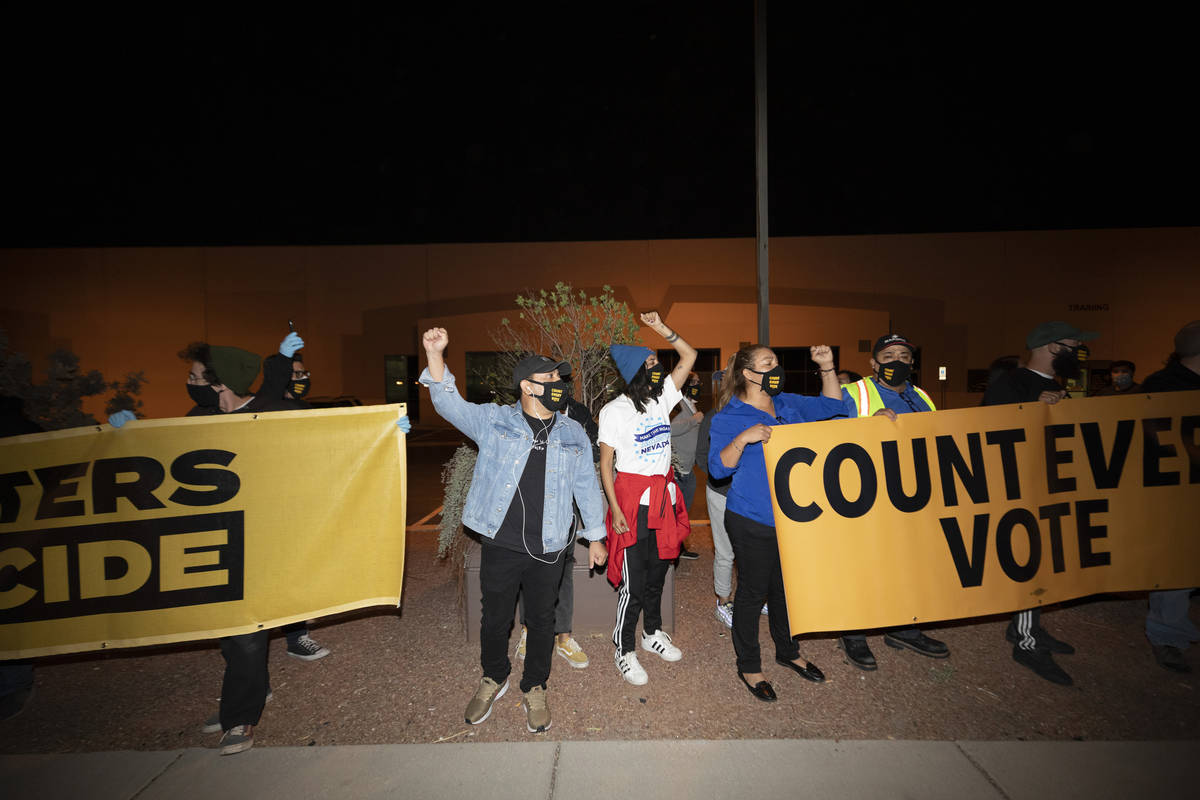 Individuals chant ÒEvery vote counts,Ó at the Clark County Election Department in Nor ...