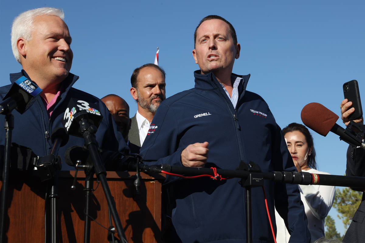 Ric Grenell, right, former director of National Intelligence, speaks during a Nevada Republican ...