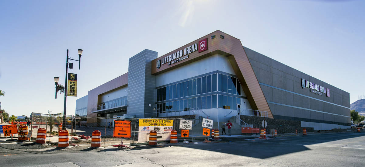 Work continues outside during opening day at the Henderson Silver Knights practice facility wit ...