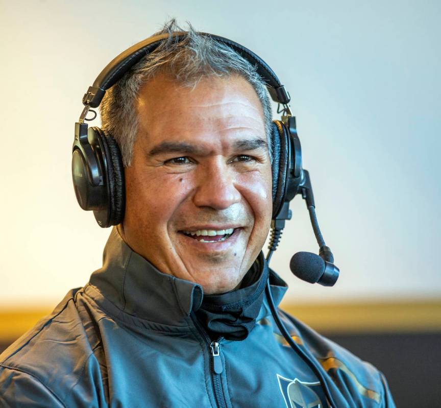Henderson Silver Knights head coach Emanuel Viveiros gives a radio interview during opening day ...