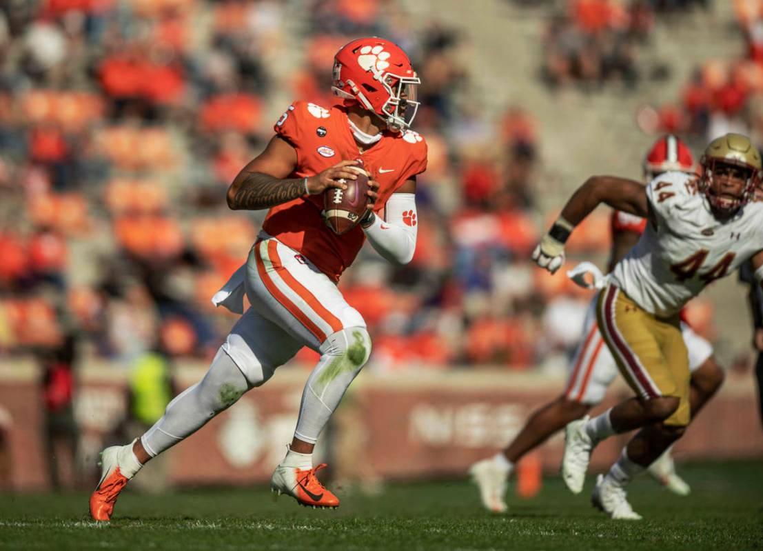 Clemson quarterback D.J. Uiagalelei (5) runs during the first half of an NCAA college football ...