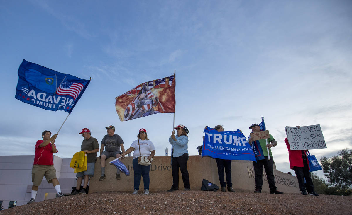 Protests continue on the hill outside the Clark County Election Department as a large, vocal cr ...