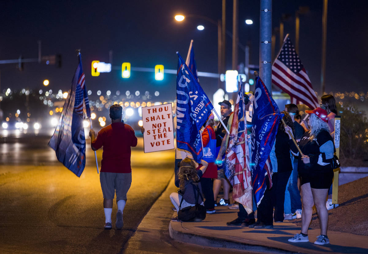 Protesters line W. Cheyenne Ave. as they gather outside the Clark County Election Department at ...