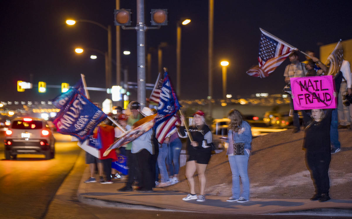 Protesters line W. Cheyenne Ave. as they gather outside the Clark County Election Department at ...