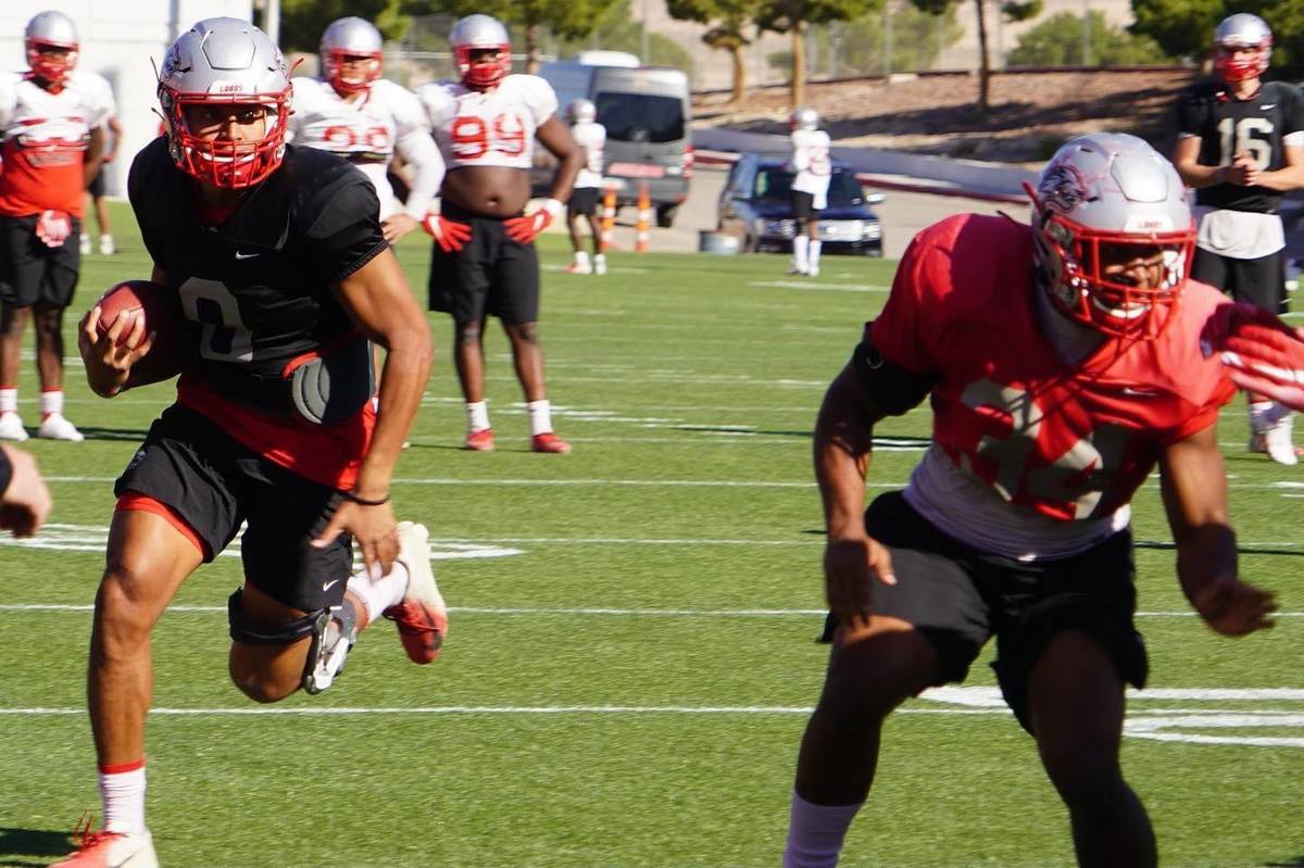 Quarterback Tevaka Tuioti, left, and the New Mexico football team have switched their home base ...