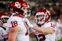 FILE - In this Saturday, Oct. 31, 2020, file photo, Oklahoma's Austin Stogner (18) celebrates a ...