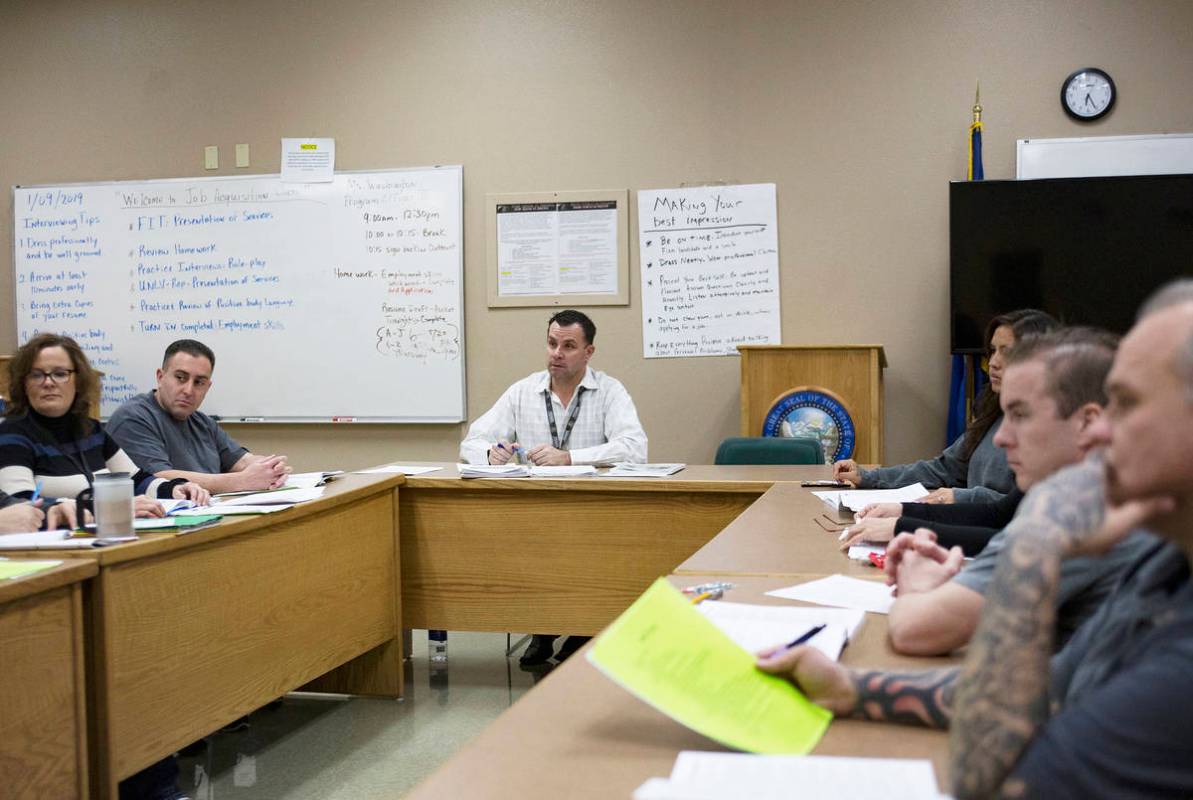 Michael Russell leads a Moral Recognition Therapy class at Casa Grande, a transitional housing ...