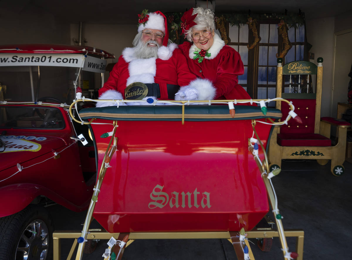 Jean Gray, 72, as "Santa Kris Kringle" and Mrs. Claus, are seen at Groeschke's home on Tuesday, ...