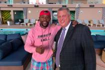 Floyd Mayweather and Derek Stevens are shown at Circa's Stadium Swim. The boxing great visited ...