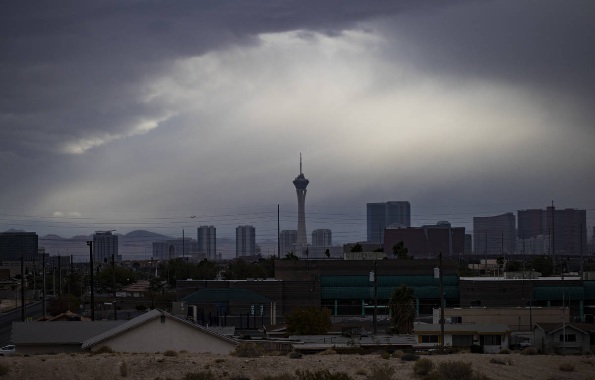 A view of the northern end of the Las Vegas Strip as rain falls in the Las Vegas Valley on Satu ...