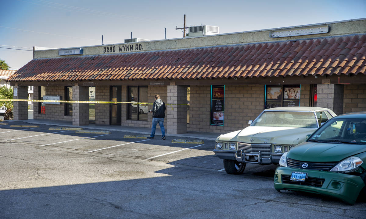 A Las Vegas police officer investigates a homicide in the central valley near 3280 South Wynn R ...