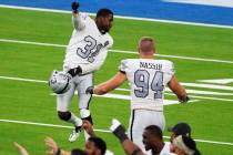 Las Vegas Raiders cornerback Isaiah Johnson (31) celebrates his stop of Los Angeles Chargers ti ...