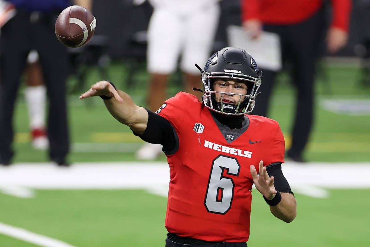 UNLV Rebels quarterback Max Gilliam (6) makes a pass against the Fresno State Bulldogs during t ...