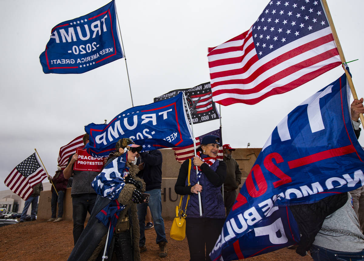 Supporters of President Donald Trump protest outside of the Clark County Election Department af ...