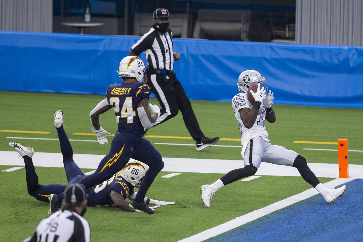 Las Vegas Raiders wide receiver Nelson Agholor (15) makes a catch and scores for a touchdown ov ...