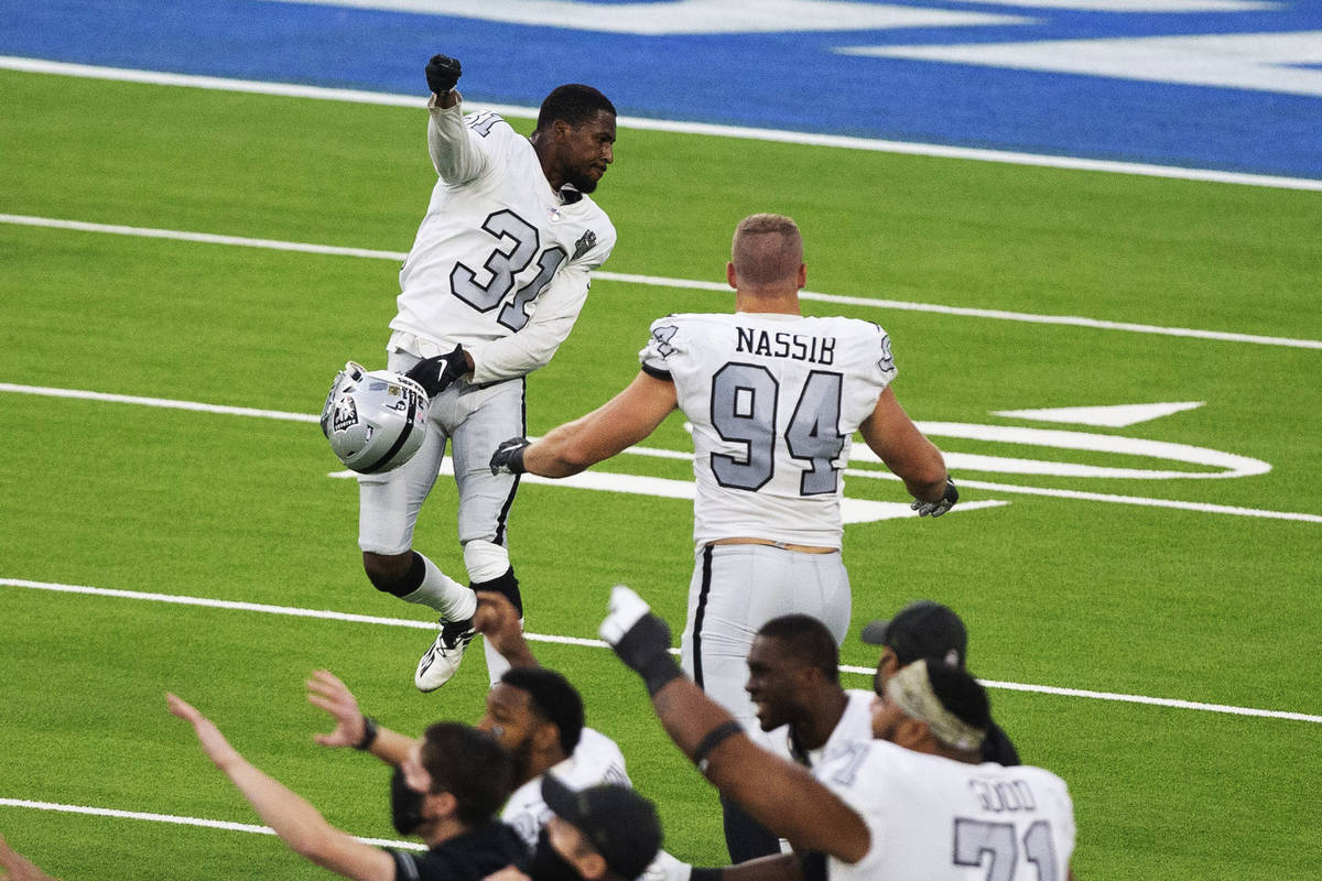Las Vegas Raiders cornerback Isaiah Johnson (31) celebrates his stop of Los Angeles Chargers ti ...