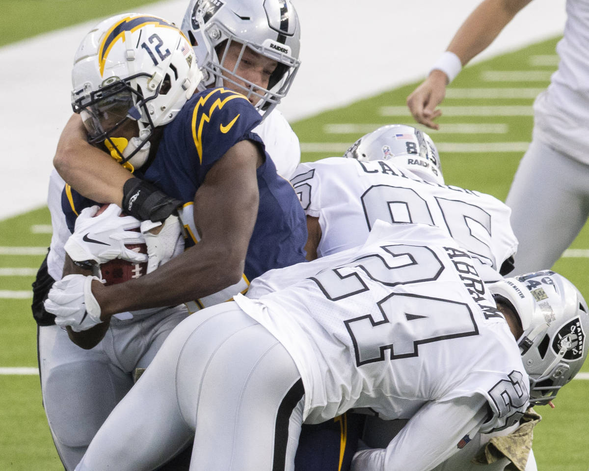 Las Vegas Raiders inside linebacker Nick Kwiatkoski (44), Las Vegas Raiders tight end Derek Car ...