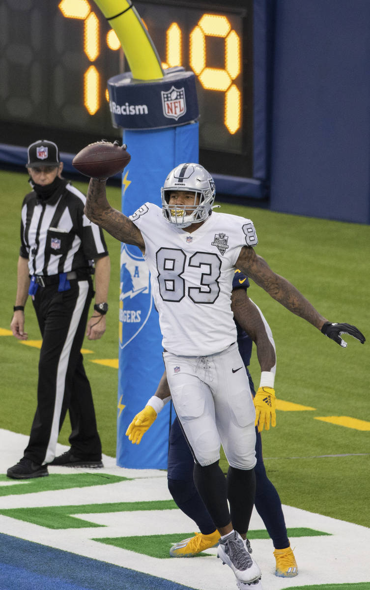 Las Vegas Raiders tight end Darren Waller (83) celebrates after catching a touchdown pass in th ...