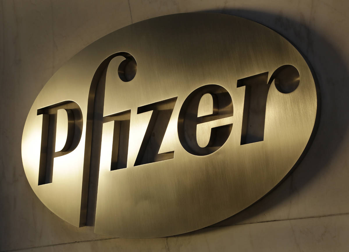FILE - In this Monday, Nov. 23, 2015, file photo, the Pfizer logo is displayed at world headqua ...