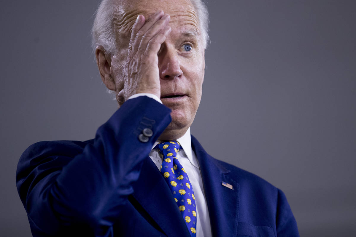 Democratic presidential candidate former Vice President Joe Biden gestures while referencing Pr ...