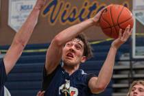 Junior Ethan Speaker (26) runs drills during practice at Boulder City High School on Wednesday, ...