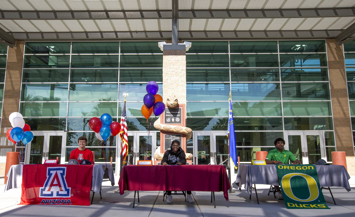 Reed Schaefer, left, Jordyn Stroud, center, and Jacob Walsh, right, pose for a photo during a S ...