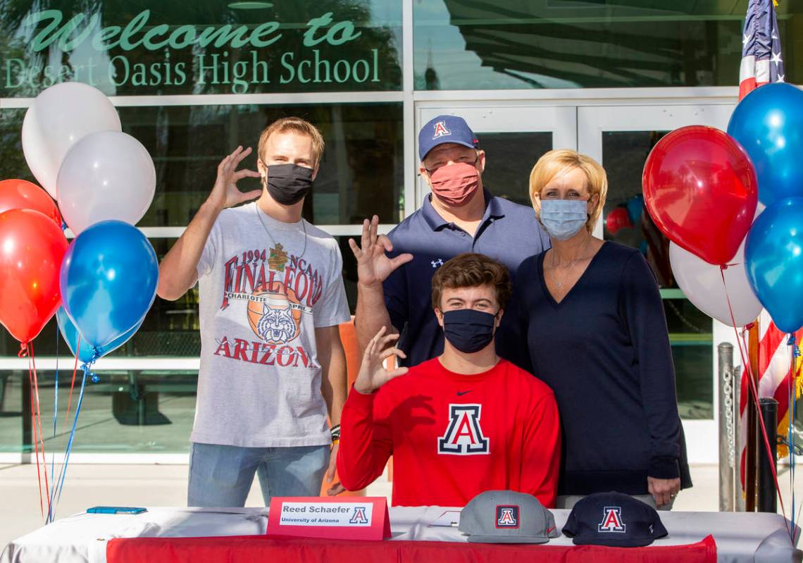 Reed Schaefer, who will play baseball at University of Arizona next year, poses for a photo wit ...