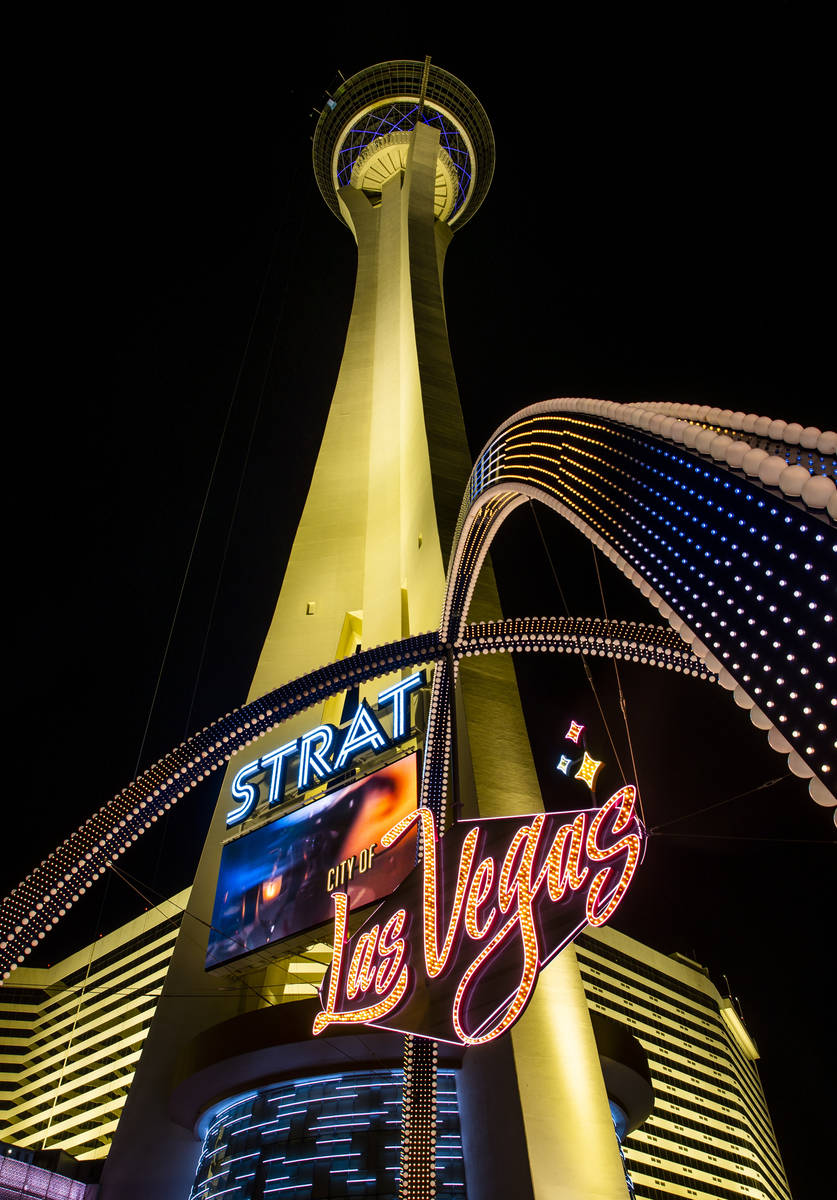 The downtown gateway arches are fully illuminated for the first time about The Strat on Wednesd ...