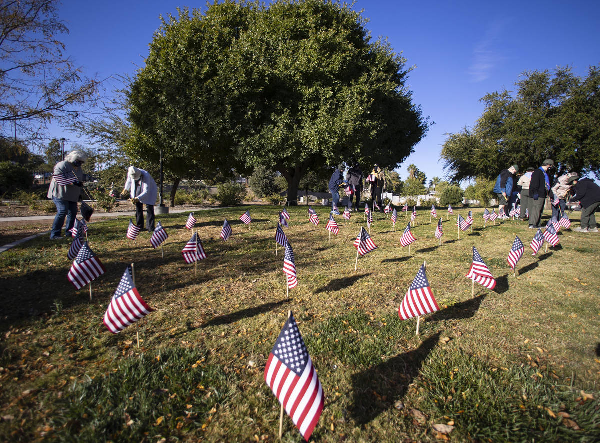 Nevada Garden Club planted 200 flags for Veterans Day at the Garden of the Pioneer Woman at Lor ...