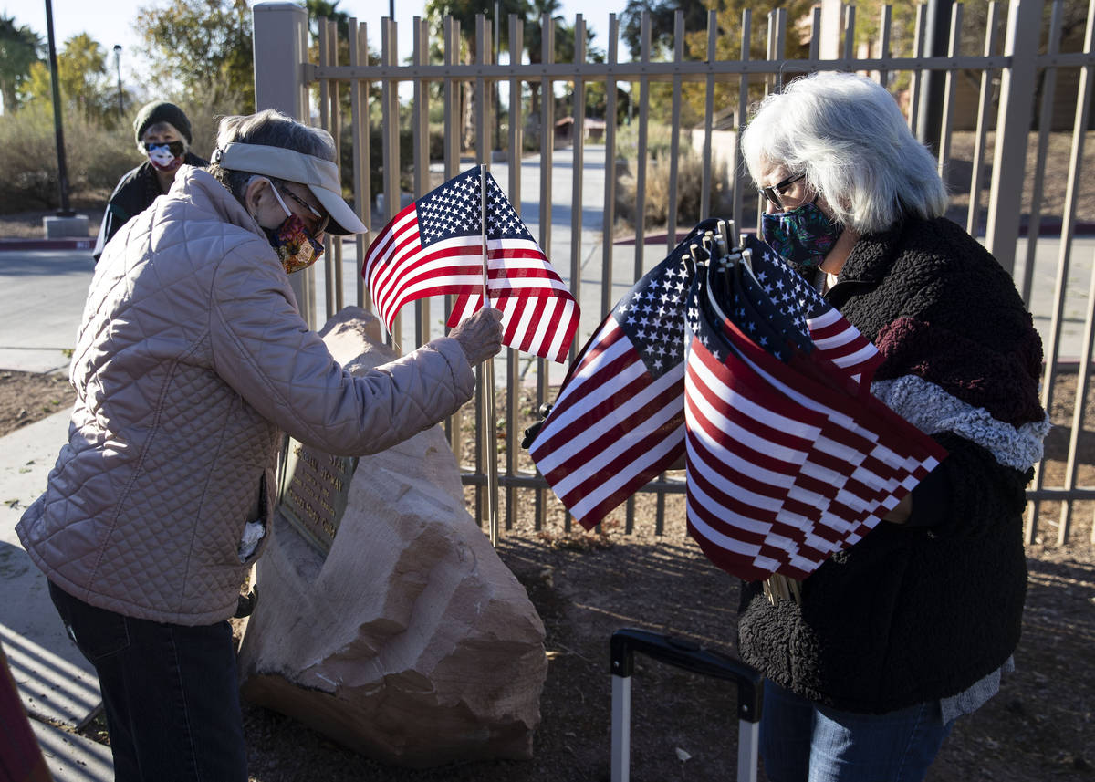 Muriel Scrivner, left, retired U.S. Air Force Sgt., and Korean War veteran, and Mary Castro, pl ...