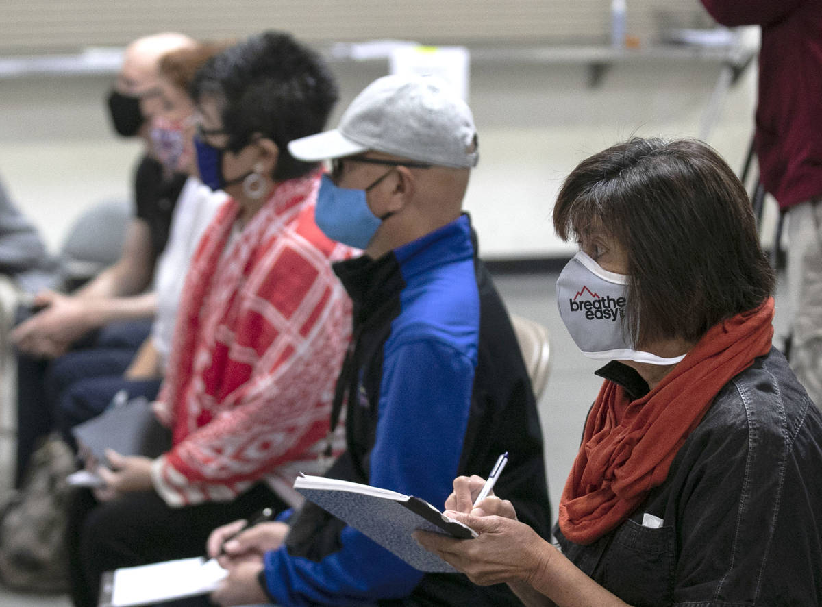 Election observers, Raul Sabido, second right, Michelle Barnes, center, and Donna West, second ...
