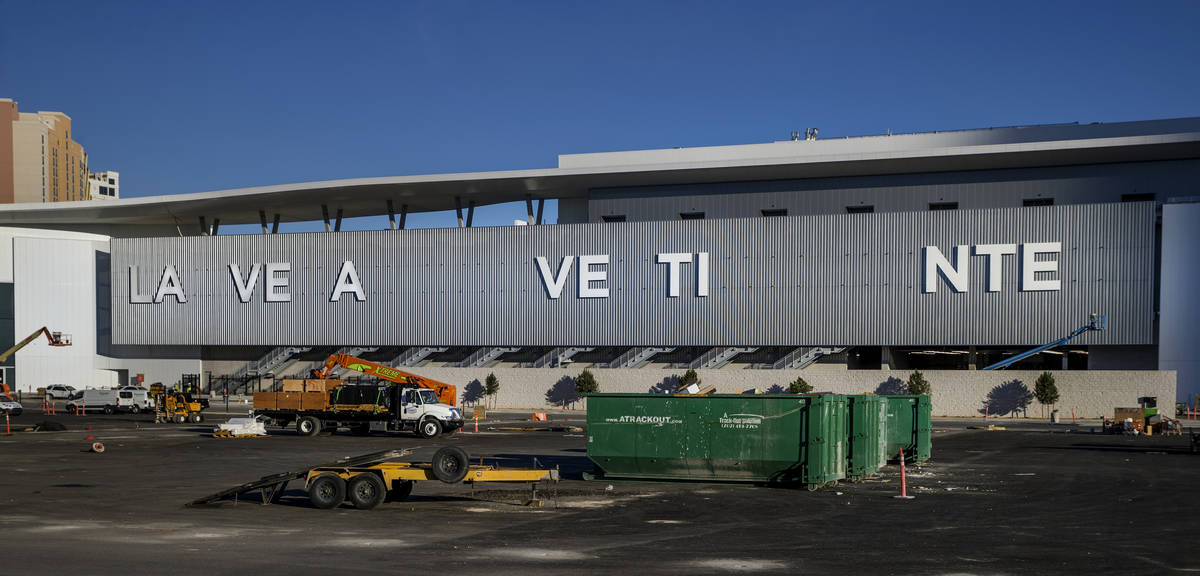 The process of putting up block letters LAS VEGAS CONVENTION CENTER continues along the new Wes ...