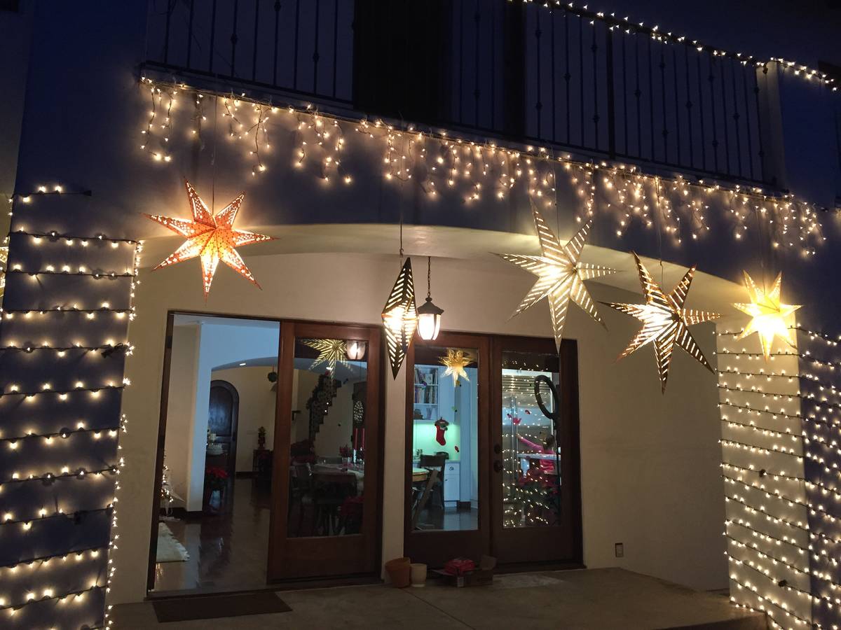 This home installation features lit exterior decorations and ornaments. (LVChristmaslights.com)