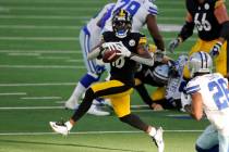 Pittsburgh Steelers wide receiver Diontae Johnson (18) runs after a reception against the Dalla ...