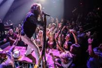 Steven Tyler of Aerosmith is shown performing on the bar in the onstage VIP section at Park The ...