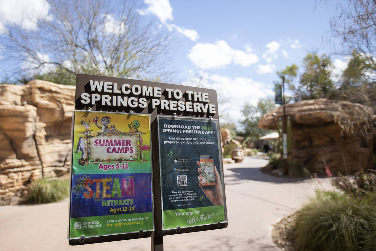 A sign at the entrance of Springs Preserve is seen on Sunday, March 15, 2020 in Las Vegas. (Ell ...