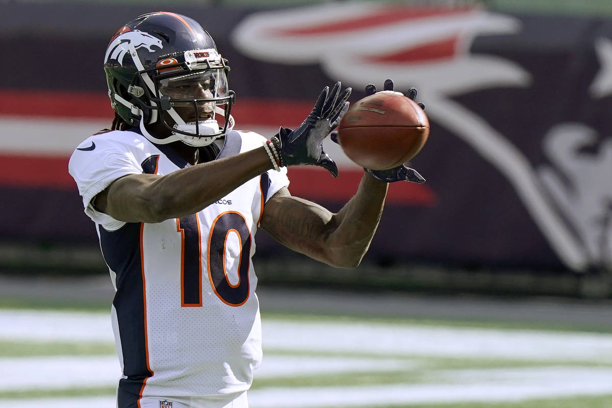 Denver Broncos wide receiver Jerry Jeudy warms up before an NFL football game against the New E ...